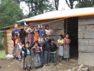 These kids were so excited about the pila and their clean hands, they apparently want to wash their feet next. Their standing in it after all.